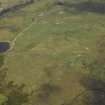 General oblique aerial view of the remains of the township and manse, taken from the SW.