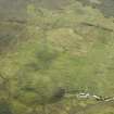 General oblique aerial view of the remains of the township and manse, taken from the SW.