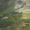 Oblique aerial view of the hunting lodge, church and burial ground, taken from the WNW.