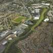 Oblique aerial view centred on the canal with Albion Rovers FC stadium adjacent, taken from the W.