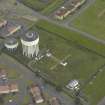 Oblique aerial view centred on the water tower, taken from the SW.