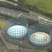 Oblique aerial view centred on the gas holders, taken from the NW.