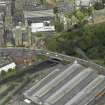 Oblique aerial view centred on the bridge with Old Partick Bridge and Western Infirmary adjacent, taken from the S.