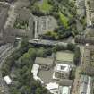 Oblique aerial view centred on the bridge with Glasgow Academy adjacent, taken from the N.
