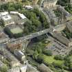 Oblique aerial view centred on the bridge with Glasgow Academy adjacent, taken from the SW.