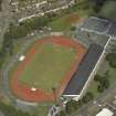 Oblique aerial view centred on the stadium, taken from the WSW.