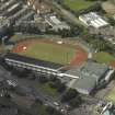 Oblique aerial view centred on the stadium, taken from the SSE.