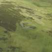 Oblique aerial view centred on the remains of the fort, taken from the NE.
