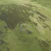 Oblique aerial view centred on the remains of the fort, taken from the N.