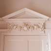 Interior. Pink drawing room, detail of door pediment