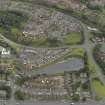 Oblique aerial view centred on the canal basin and the housing, taken from the NNW.