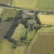 General oblique aerial view centred on the house, taken from the NNW.