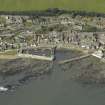 Oblique aerial view centred on the harbour with the town adjacent, taken from the SE.