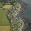 General oblique aerial view centred on the harbour and town, taken from the W.