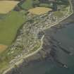 General oblique aerial view centred on the harbour and town, taken from the SW.