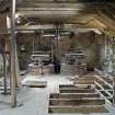 Interior. First floor. View looking towards stones. Note that the bruiser has been removed.