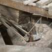 Interior. First floor. Detail of 'Damsel ' or grain feed apparatus and the hopper as it feeds grain into the grinding stones.