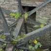 Detail of waterwheel axle as it enters the mill building.