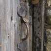 Detail of original door handle on storage area door.