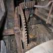 Interior. Ground floor. Milling area. Gear cupboard showing pit wheel and wallower.