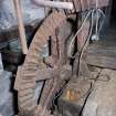 Interior. Ground floor. Milling area. Gear cupboard showing pit wheel and wallower.