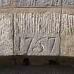 Detail.  Date above stable arch '1757'.