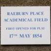 Detail of sign on rear elevation of pavilion from ESE.