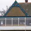 Detail of original gable with part of later balcony from WNW.