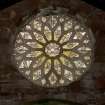 Interior. Nave, view of rose window at W end