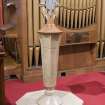 Interior view of Glass Parish Church showing detail of font.