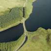 Oblique aerial view centred on the reservoir causeway, taken from the W.