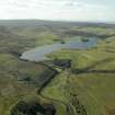 General oblique aerial view centred on the resevoir with the remains of the fort adjacent, taken from the E.