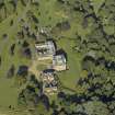 Oblique aerial view centred on the country house, taken from the SW.