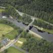 Oblique aerial view centred on the bridge, taken from the SW.