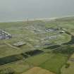 General oblique aerial view centred on the gas terminal, taken from the W.