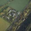 General oblique aerial view centred on the house and hospital buildings, taken from the SW.