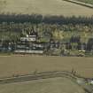 Oblique aerial view centred on the central portion of the former hospital, taken from S.