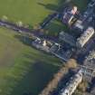 Oblique aerial view centred on the the rugby pavilion, taken from the SW.