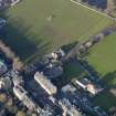 Oblique aerial view centred on the the rugby pavilion, taken from the SE.