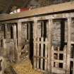 Interior. Byre, view from west showing timber stalls