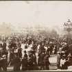 View of crowds with exhibition buildings at Kelvingrove Park faintly in the background at the International Exhibition in Glasgow 1901.

