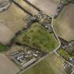 General oblique aerial view centred on the orchard and the remains of the rig with the smallholding, cottages and poultry houses adjacent, from the NNE.