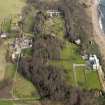 General oblique aerial view centred on the walled garden and orangery with the home farm, doocot, cottages and houses adjacent, taken from the SW.