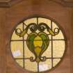 Interior. Detail of stained glass door panel.