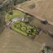 Oblique aerial view centred on the walled garden and estate cottage, taken from the SW.