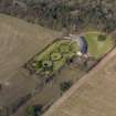 Oblique aerial view centred on the walled garden and estate cottage, taken from the SE.