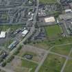 General oblique aerial view centred on St Francis' School with the Castlebrae Housing Estate adjacent, taken from the E..