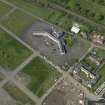 Oblique aerial view centred on Craigmiller Primary School, taken from the SE.