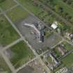 Oblique aerial view centred on Craigmiller Primary School, taken from the SE.