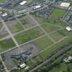 General oblique aerial view centred on Craigmiller Primary School with St Francis' School adjacent, taken from the NE.